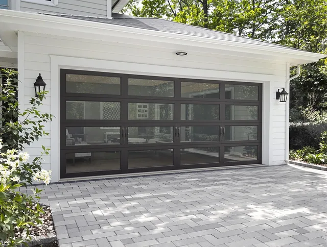 Bedford Heights Garage Door Repair design specialist presenting custom garage door options to Bedford Heights homeowner